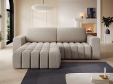 Canapé d’angle convertible BOZEN en tissu bouclette capitonné avec coffre – 250 cm