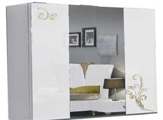 Grande armoire de chambre design 3 portes coulissantes bois laqué blanc et doré Jade 270 cm