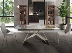 Table à manger ovale extensible Karina L 180/240 cm - Plateau en porcelaine blanche et pied acier marron clair