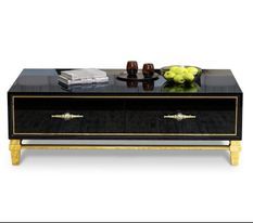 Table basse design teinté verre noir trempé et pieds métal doré Baro L 130 cm