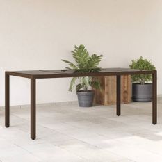 Table de jardin avec dessus en verre marron résine tressée