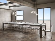Table moderne extensible 8 à 20 places L 180 à 440 cm blanche effet marbre avec cadre et pieds en métal anthracite Likro