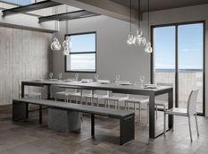 Table moderne extensible 8 à 20 places L 180 à 440 cm gris béton avec cadre et pieds en métal anthracite Likro
