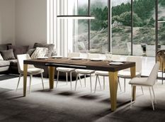 Table rectangulaire extensible 6 à 18 personnes L 130 à 390 cm bois foncé et pieds métal doré Faye