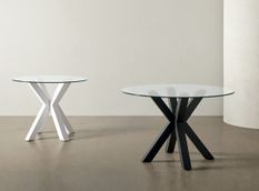 Table ronde moderne Jadys – Plateau en verre et pieds croisés en métal