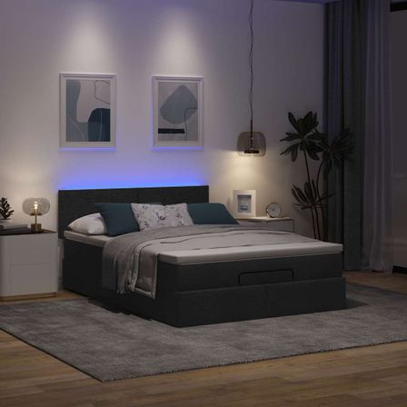 Lit ottoman avec matelas noir 140x200 cm tissu