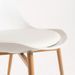 Chaise scandinave blanche avec coussin simili cuir blanc et pieds bois naturel Keny - Photo n°4
