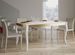 Table rectangulaire extensible 6 à 14 personnes L 180 à 284 cm frêne blanc et métal doré Odeza - Photo n°1
