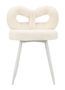 Chaise Ilary blanche bouclée design moderne