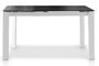 Table à manger design extensible verre teinté noir et pieds métal blanc Mikale 140/190 cm