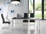 Table à manger design extensible verre teinté noir et pieds métal blanc Mikale 140 à 190 cm