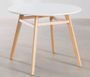 Table ronde 120 cm scandinave blanche et pieds bois clair Bristol