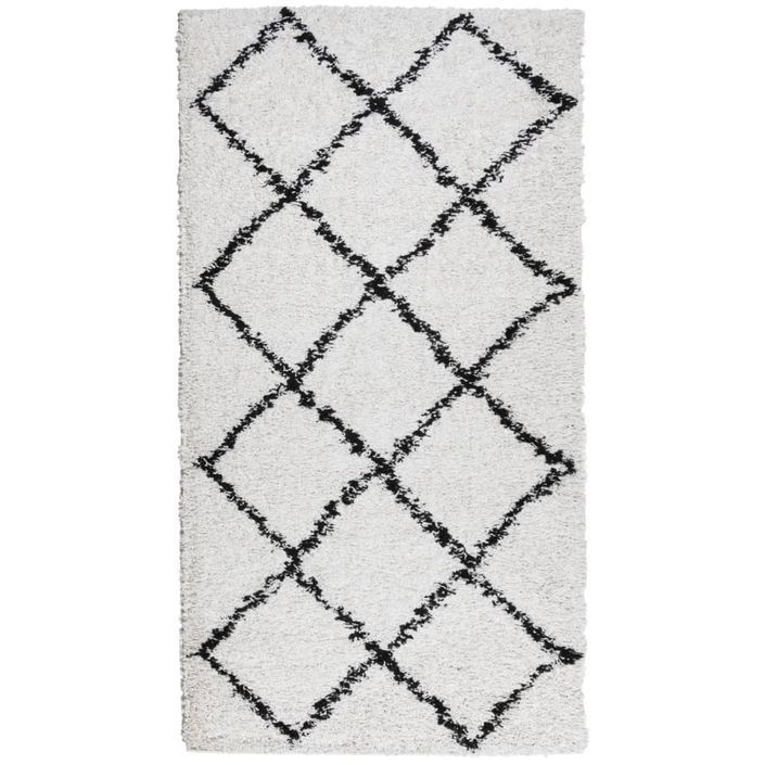 Tapis shaggy à poils longs moderne crème et noir 60x110 cm - Photo n°1